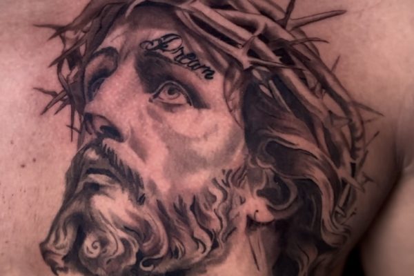 Black and Gray Grey Religious Jesus Tattoo Done at Skylla Tattoo Studio in Arlington, Texas by Bravo