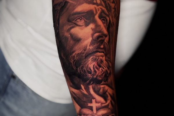 Black and Gray Grey Religious Jesus Tattoo Done at Skylla Tattoo Studio in Arlington, Texas by Bravo
